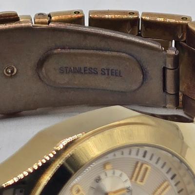 LOT 35J: Invicta Pro Diver Men's Watch and Caravelle by Bulova New York Women's Watch