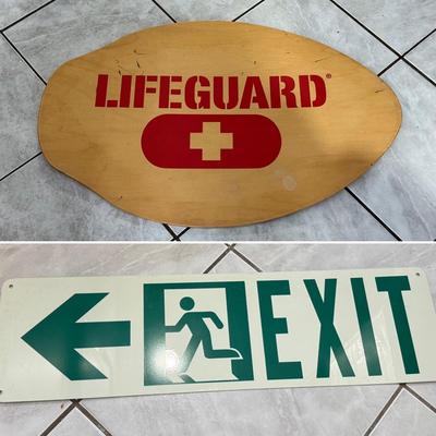 LOT 77: 25 x 7 Green Metal Exit Sign & Wood Lifeguard Wall Decor