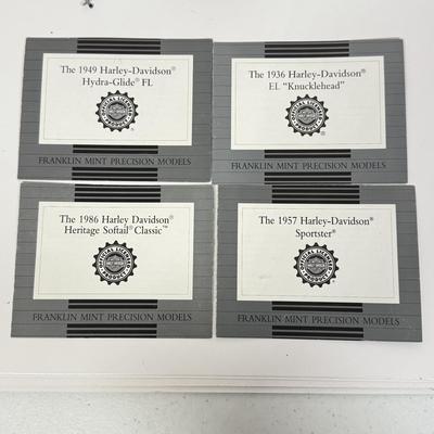 LOT 81: The Franklin Mint Motorcycle Models w/ COAs & American Flag Motorcycle Model w/ Helmet & Display Case