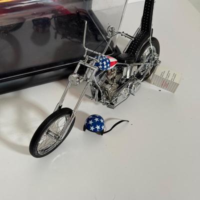 LOT 81: The Franklin Mint Motorcycle Models w/ COAs & American Flag Motorcycle Model w/ Helmet & Display Case