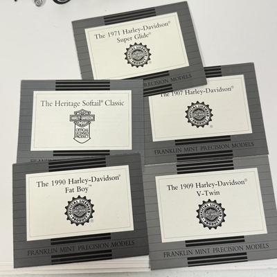 LOT 81: The Franklin Mint Motorcycle Models w/ COAs & American Flag Motorcycle Model w/ Helmet & Display Case