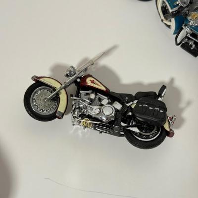 LOT 81: The Franklin Mint Motorcycle Models w/ COAs & American Flag Motorcycle Model w/ Helmet & Display Case