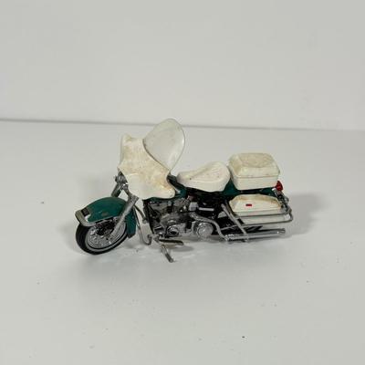 LOT 81: The Franklin Mint Motorcycle Models w/ COAs & American Flag Motorcycle Model w/ Helmet & Display Case