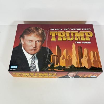 LOT 85: Trunk for Trivia, Cheers Board Game, Trump Board Game & Top Ten Lists Game