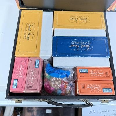 LOT 85: Trunk for Trivia, Cheers Board Game, Trump Board Game & Top Ten Lists Game