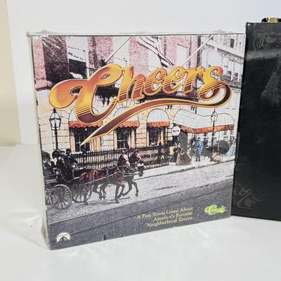 LOT 85: Trunk for Trivia, Cheers Board Game, Trump Board Game & Top Ten Lists Game