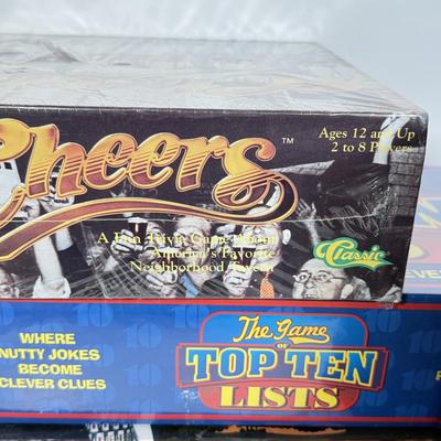 LOT 85: Trunk for Trivia, Cheers Board Game, Trump Board Game & Top Ten Lists Game