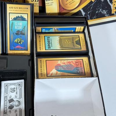 LOT 85: Trunk for Trivia, Cheers Board Game, Trump Board Game & Top Ten Lists Game