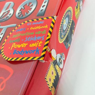 LOT 86: Quicksilver Estes Ready To Fly Model Rocket Set & DK Ultimate Robot Kit