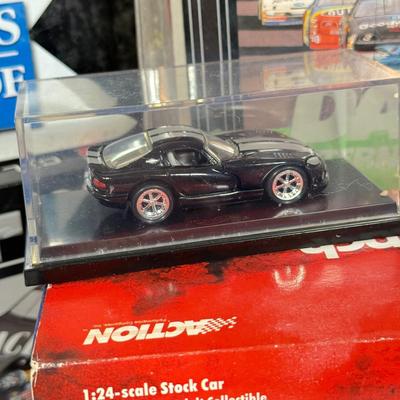 LOT 89: NASCAR / Racing Daytona 500 & More Programs, NASCAR Collectors Edition Checkers/Tic Tac Toe NIP, Clint Bowyer Model &...