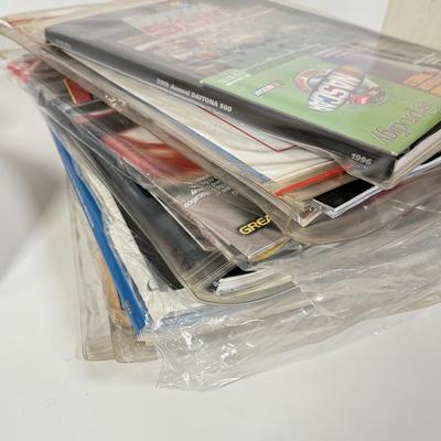 LOT 89: NASCAR / Racing Daytona 500 & More Programs, NASCAR Collectors Edition Checkers/Tic Tac Toe NIP, Clint Bowyer Model &...