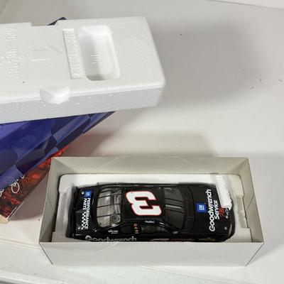 LOT 89: NASCAR / Racing Daytona 500 & More Programs, NASCAR Collectors Edition Checkers/Tic Tac Toe NIP, Clint Bowyer Model &...