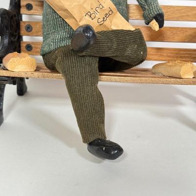 LOT 94: 1997 Byer's Choice The Carolers Man on Bench Feeding Birds