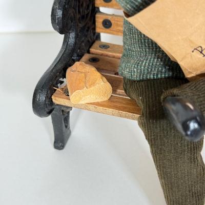 LOT 94: 1997 Byer's Choice The Carolers Man on Bench Feeding Birds