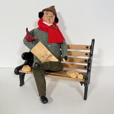 LOT 94: 1997 Byer's Choice The Carolers Man on Bench Feeding Birds