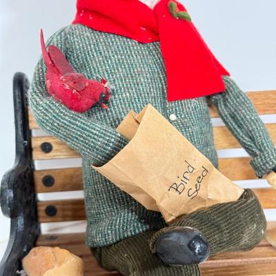 LOT 94: 1997 Byer's Choice The Carolers Man on Bench Feeding Birds