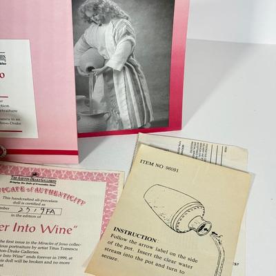 LOT 95: Jesus Water into Wine Doll by Ashton-Drake Galleries w/ Pots & COA