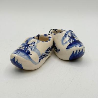LOT 101: Porcelain Figurines: Victorian Figures, Delft Style Clogs & Windmill