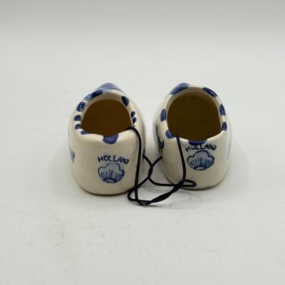 LOT 101: Porcelain Figurines: Victorian Figures, Delft Style Clogs & Windmill