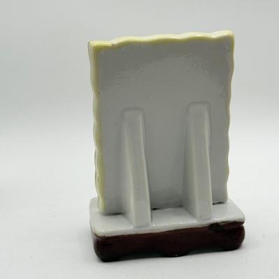 LOT 102: Vintage Japanese Porcelain Figurines: Calendar w/ Pages, Atlantic City Souvenir & More