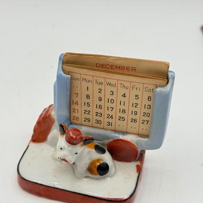 LOT 102: Vintage Japanese Porcelain Figurines: Calendar w/ Pages, Atlantic City Souvenir & More