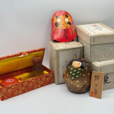 LOT 104: Dragon Topped "Robert" Stamp Set, Dharma Matchbook & Three Japanese Kokeshi Wooden Dolls