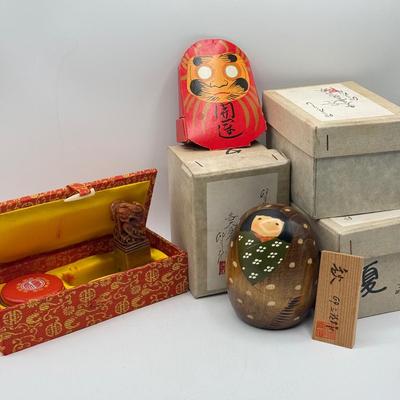 LOT 104: Dragon Topped "Robert" Stamp Set, Dharma Matchbook & Three Japanese Kokeshi Wooden Dolls
