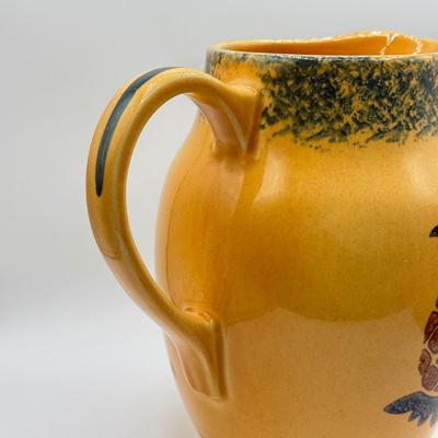 LOT 107: Pfaltzgraff Pineapple "Friendship" Pitcher & Hula Girl S&P Shakers