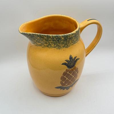 LOT 107: Pfaltzgraff Pineapple "Friendship" Pitcher & Hula Girl S&P Shakers