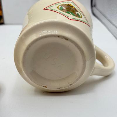 LOT 108: Vintage Girl & Boy Scouts Manuals & Cub Scouts Commemorative Mugs
