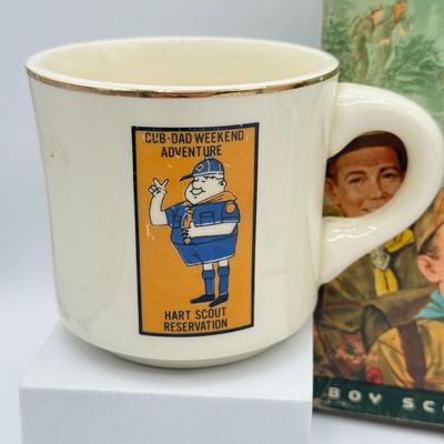 LOT 108: Vintage Girl & Boy Scouts Manuals & Cub Scouts Commemorative Mugs