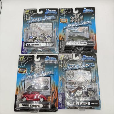 LOT 116: Coca Cola Collection: Matchbox Cars, Santa Playing Cards & NASCAR Fabric