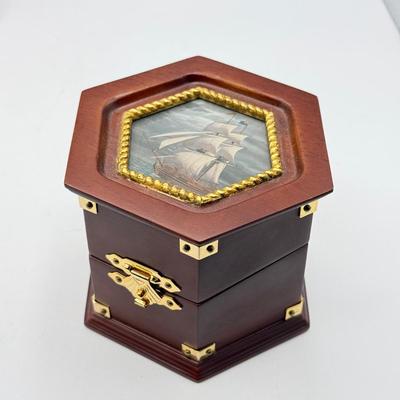 LOT 120: Franklin Mint Chocolate El Cazador Pocket Watch, Coastal Navigation & Piloting Guides