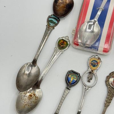 LOT 147: Collection of Souvenir Spoons: Pewter, Silver Plate & More