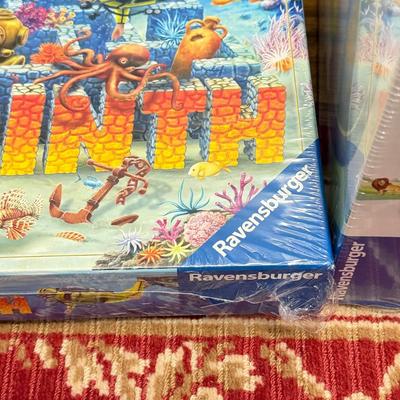 LOT 161: Sealed NIP Puzzles: 3D Ravensberger, Advertising & Ocean Themed