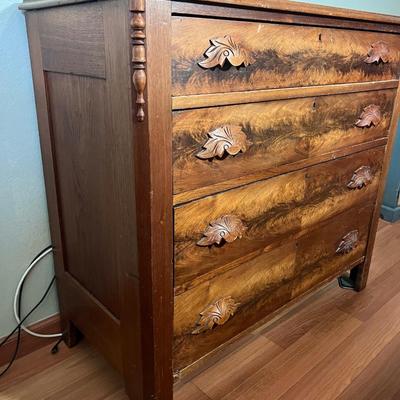 Walnut 4-Drawer Dresser with "fruit and nut" pulls.