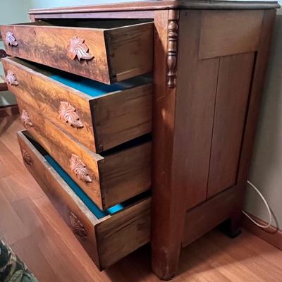 Walnut 4-Drawer Dresser with "fruit and nut" pulls.