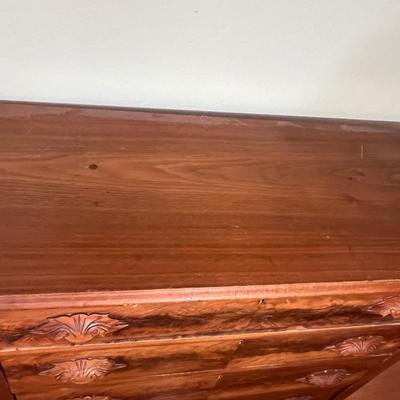 Walnut 4-Drawer Dresser with "fruit and nut" pulls.