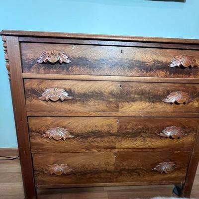 Walnut 4-Drawer Dresser with "fruit and nut" pulls.