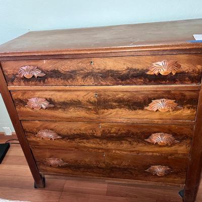 Walnut 4-Drawer Dresser with "fruit and nut" pulls.