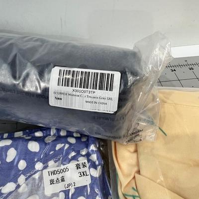 Pants Size 5XL and (2) Tops Size 2xl and 3 Xl 