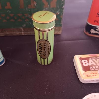 A COLLECTION OF OLD TINS