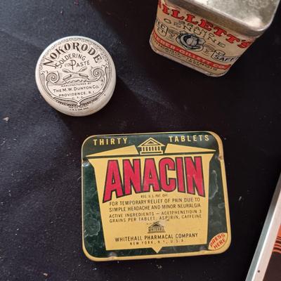 A COLLECTION OF OLD TINS