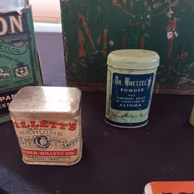 A COLLECTION OF OLD TINS