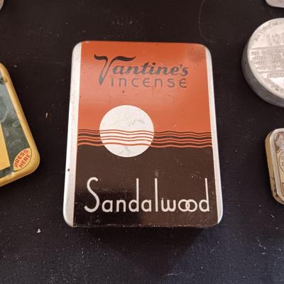 A COLLECTION OF OLD TINS