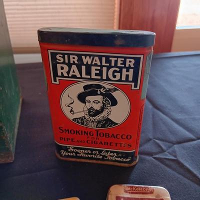 A COLLECTION OF OLD TINS