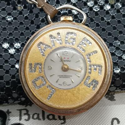 LOT 35: Napier Bracelet, Whiting and Davis Change Purse, Lucerne LA Watch & More