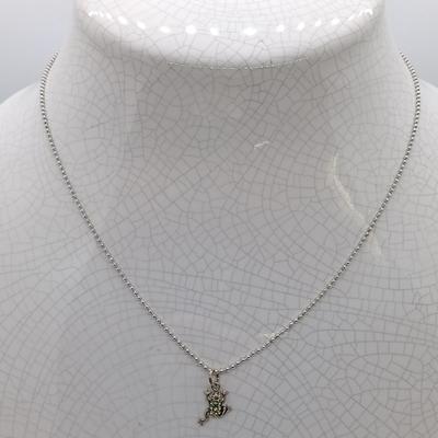 LOT 39: Sterling Silver Collection - Frog Pendant with Gemstones, Sun Shaped Perfume Pendant, Textured Braid Ring & More