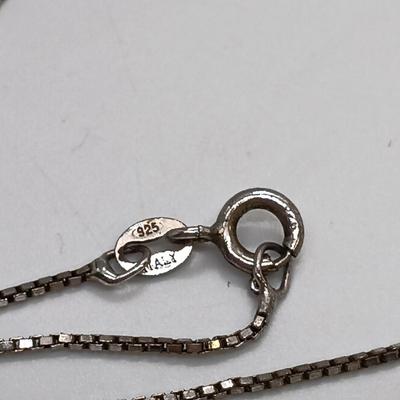 LOT 39: Sterling Silver Collection - Frog Pendant with Gemstones, Sun Shaped Perfume Pendant, Textured Braid Ring & More