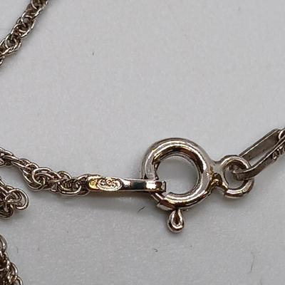 LOT 39: Sterling Silver Collection - Frog Pendant with Gemstones, Sun Shaped Perfume Pendant, Textured Braid Ring & More